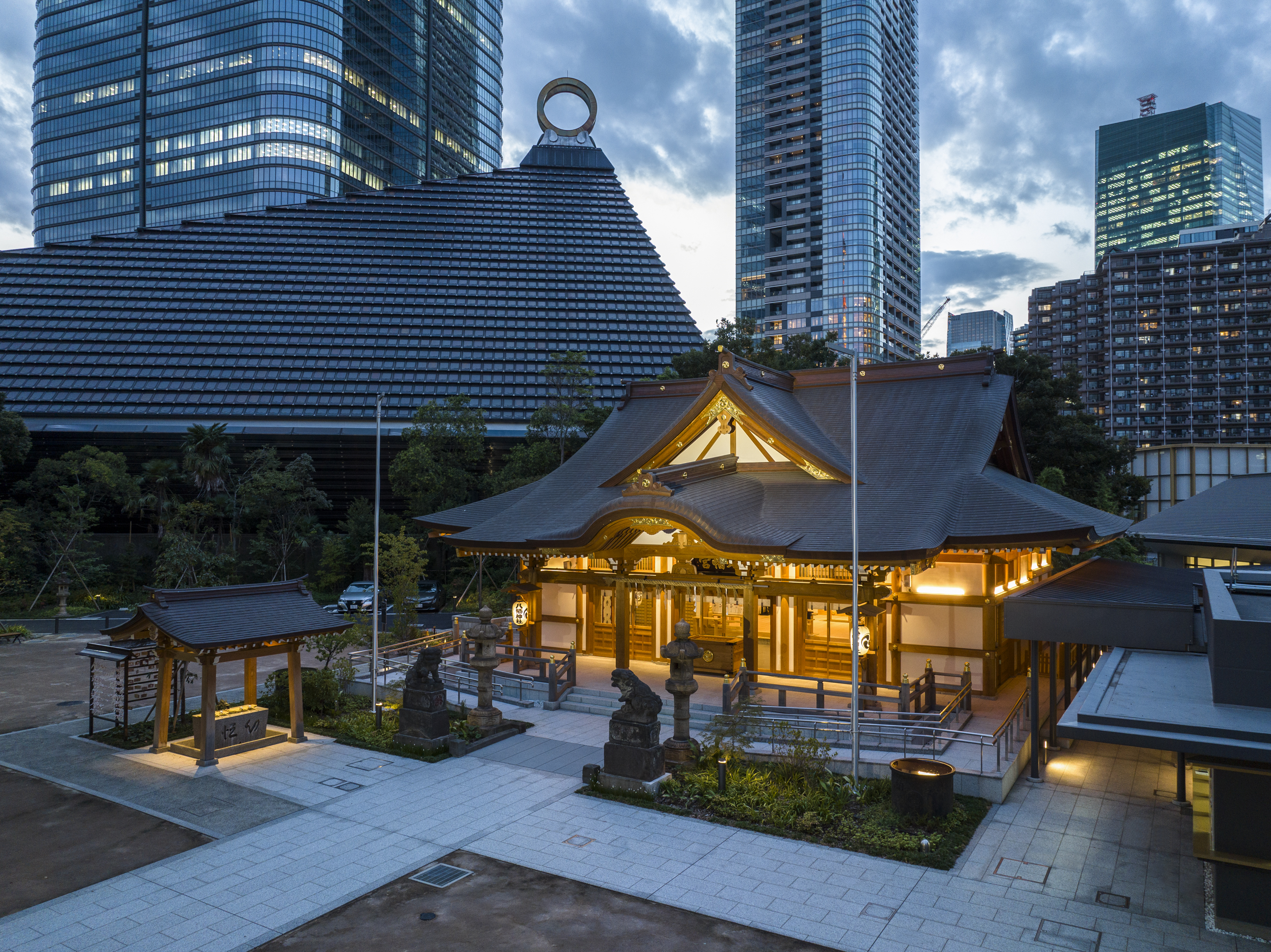 Nishikubo Hachiman Shrine illuminated at dusk in Toranomon